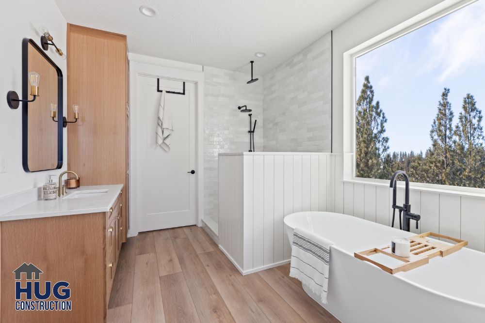 The Ridge At Hangman. Interior photo of the bathroom with soaking tub and vanity.