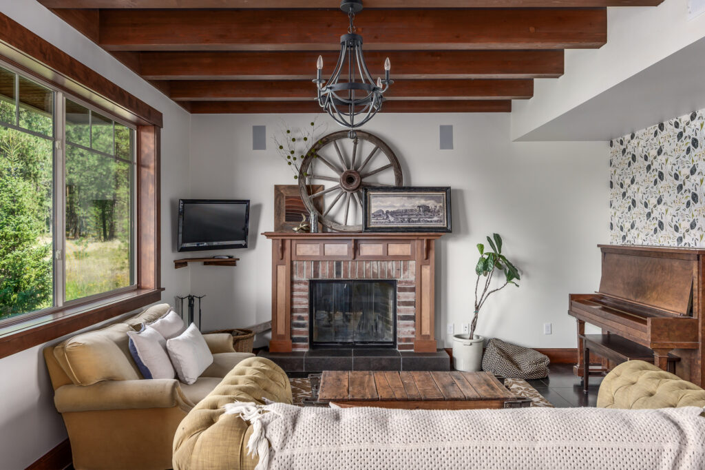 Smythe Road. Custom Home. Interior photo of the living room with fireplace.