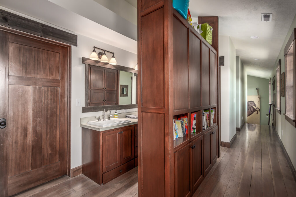 Smythe Road. Custom Home. Interior photo of a side sink and hallway.