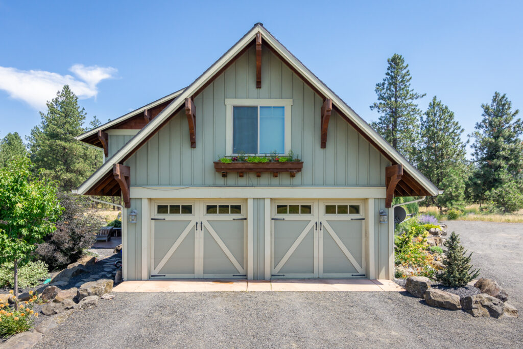 Custom Home. Exterior photo of the rear of the double garage.