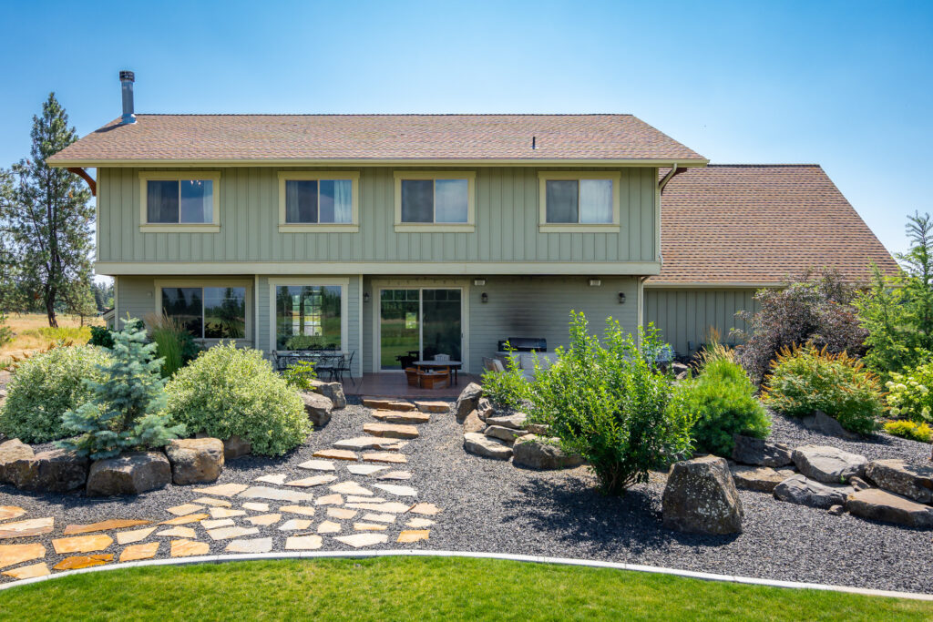 Smythe Road. Custom Home. Exterior photo of the rear of the house.