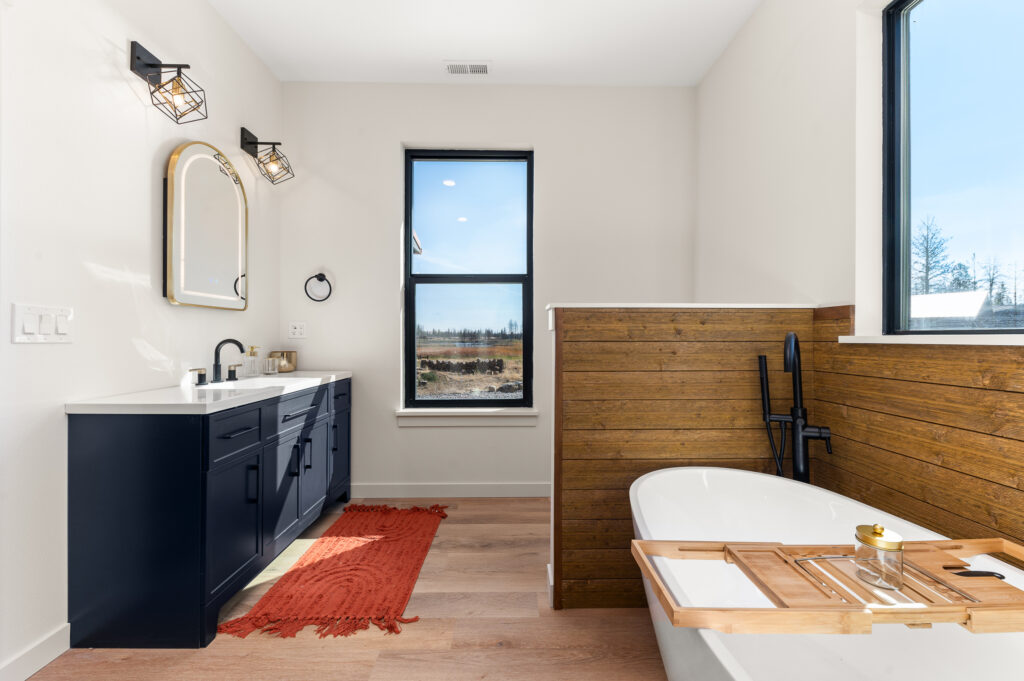 Sequoia. 2024 People's Choice Award Winner. Bathroom vanity and soaking tub.