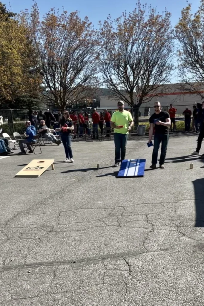 Subcontractors' BBQ. Playing cornhole.