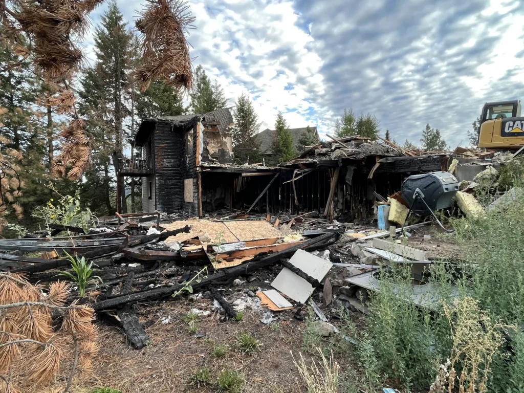 hug-construction-fire-rebuild-demolition-site-hillside-home | Hug Construction