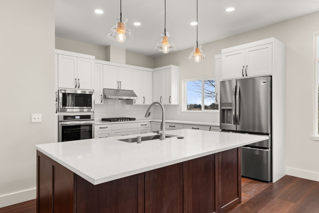 ADU-78. Interior photo of kitchen island with appliances.