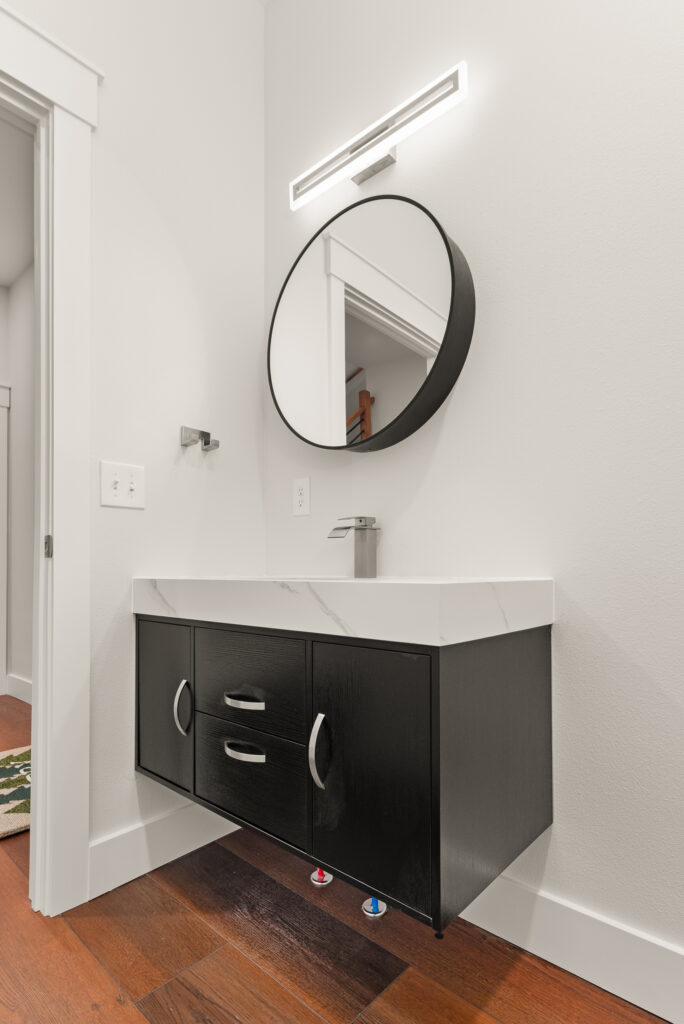 ADU-78. Interior photo of bathroom with floating vanity.