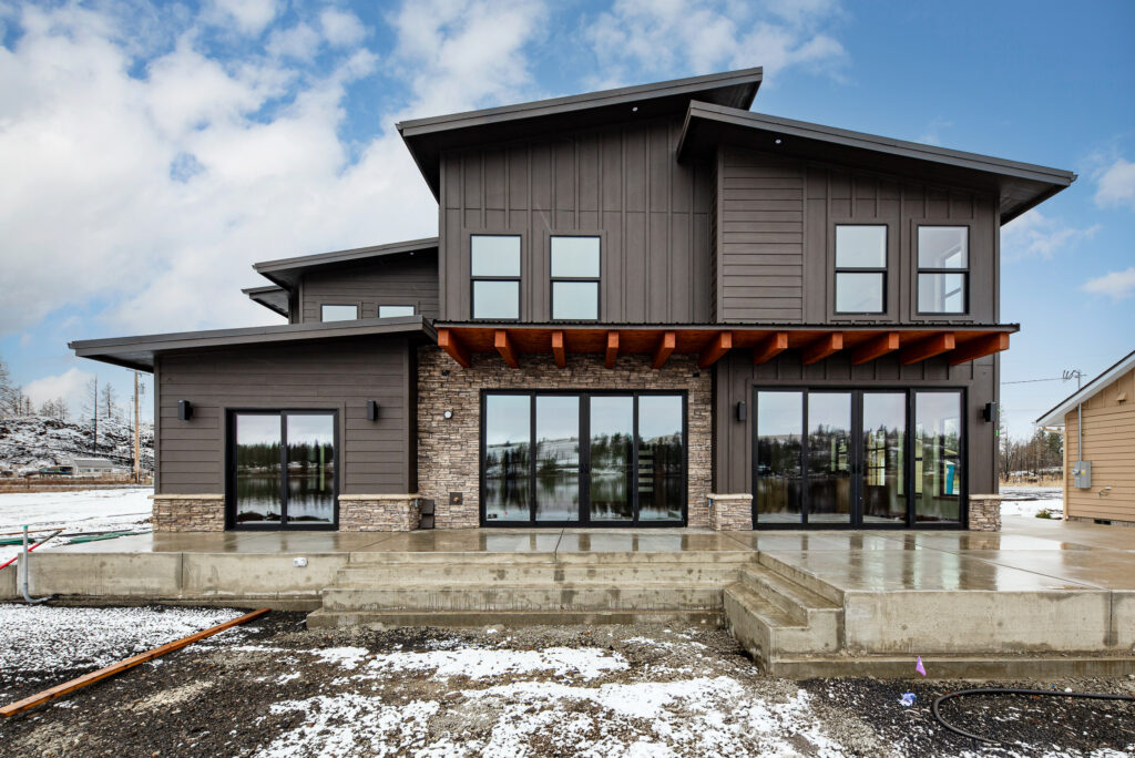 Exterior shot of the new custom waterfront home.