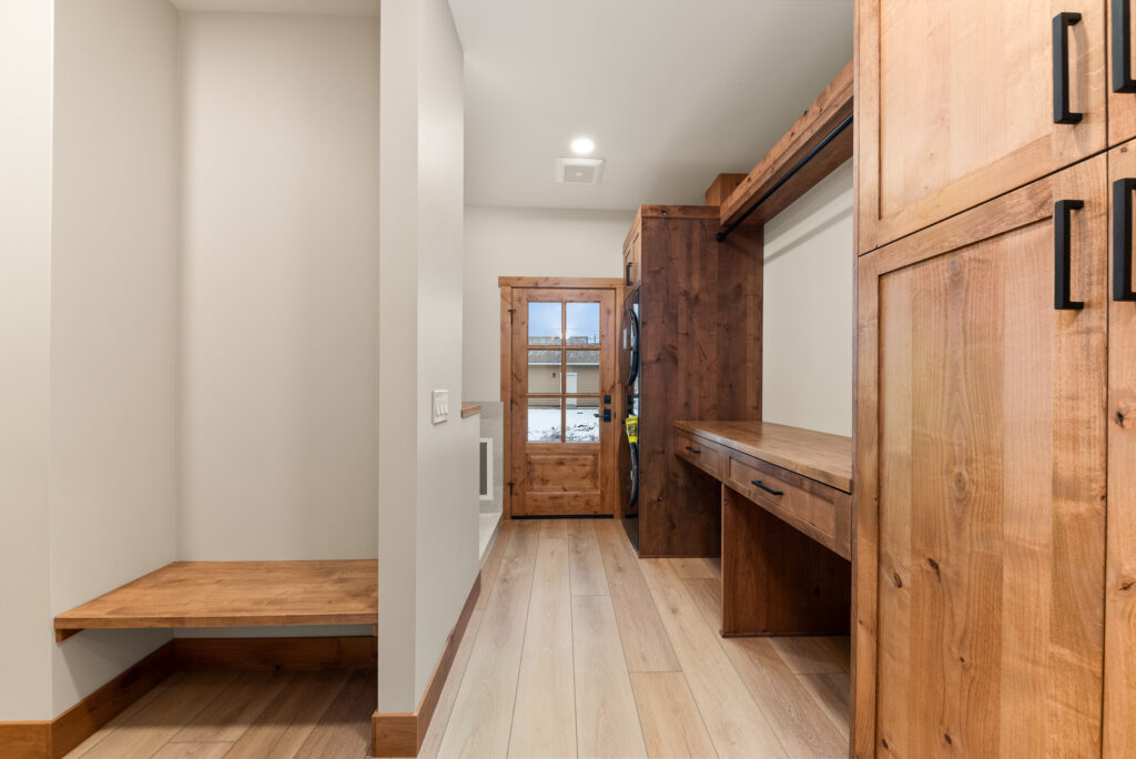 Alderwood. Interior photo of the laundry room custom waterfront home.