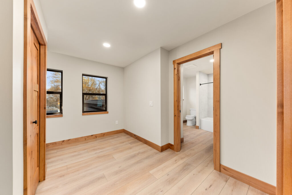 Alderwood. Interior photo of bedroom.