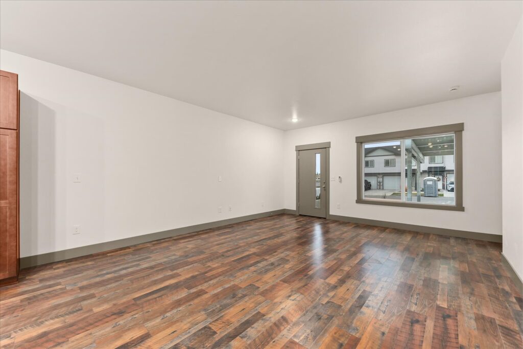 Multi-Family Dwelling. Interior photo of front room and entrance.