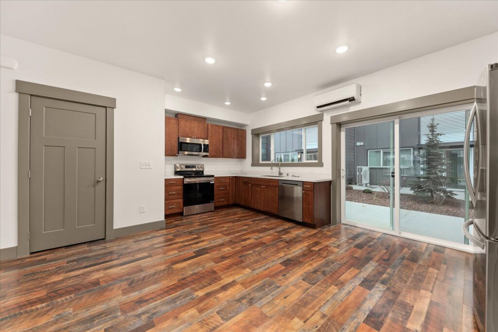 Multi-Family Dwelling. Interior photo of kitchen oven and dishwasher.