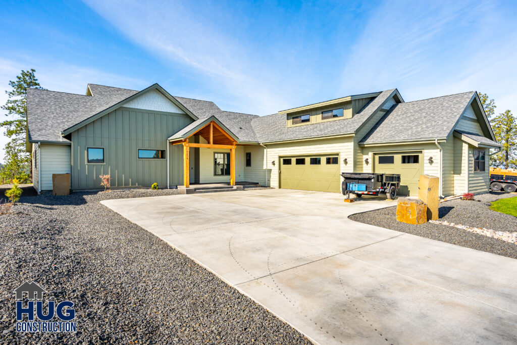 Exterior shot of the front entrance and double garage.