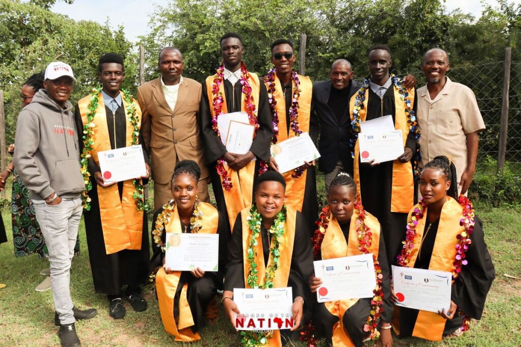 Giving. A photo of graduates of the Heroes of the Nation program.