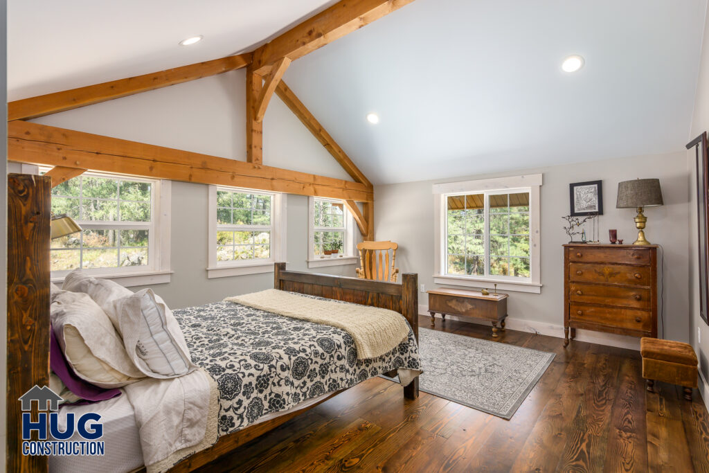 Interior photo of bed in bedroom.