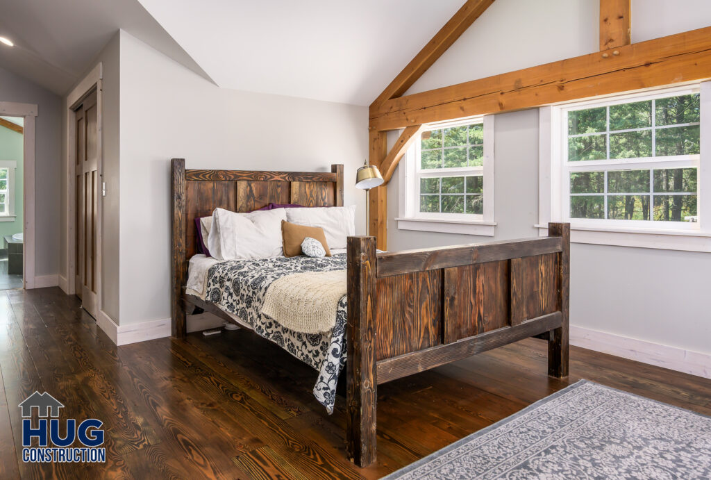 Hatch Road. Interior photo of bed in bedroom.