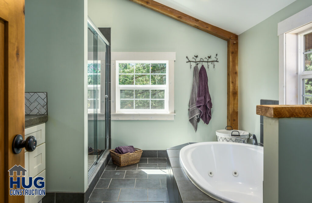 Interior photo of bathroom and soaking tub.