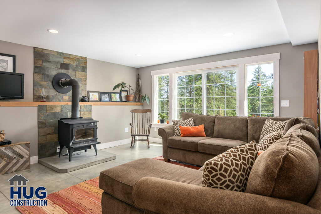 Hatch Road. Interior photo of family room with woodstove.