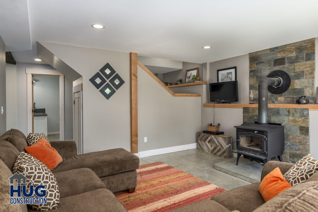 Interior photo of family room with woodstove.