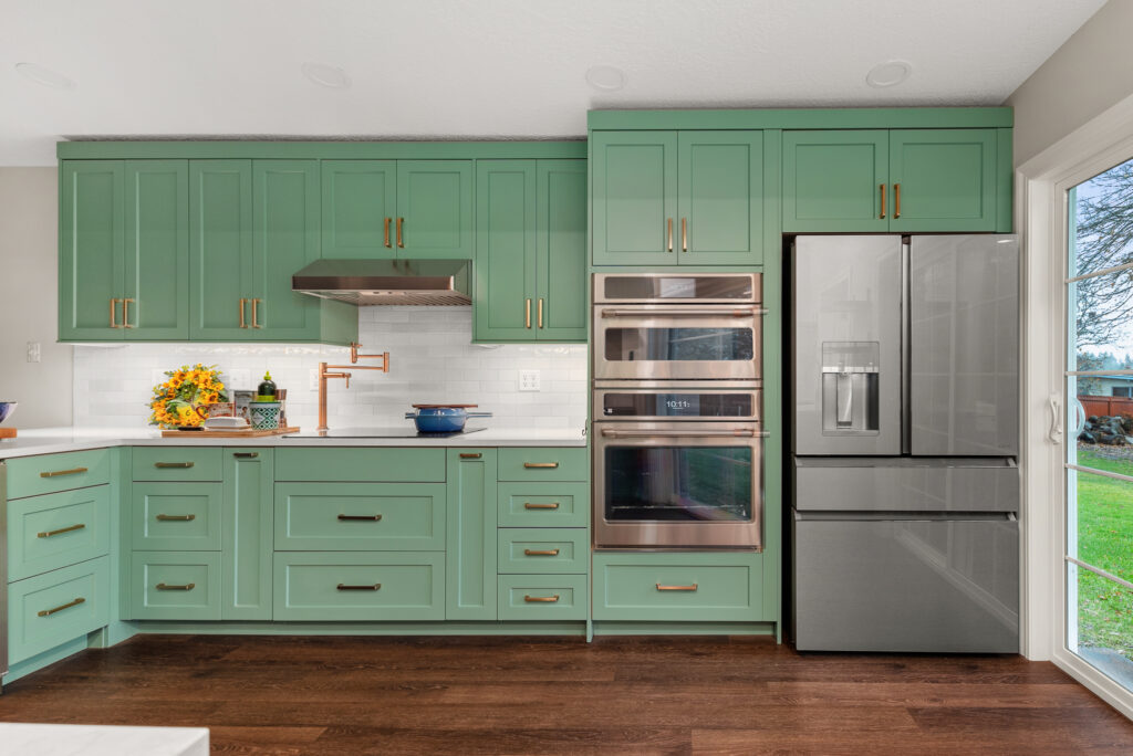 Interior photo of kitchen with appliances.