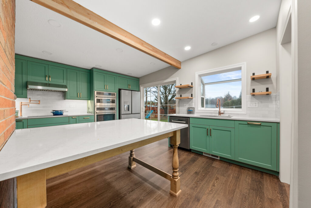 Interior photo of kitchen and table.