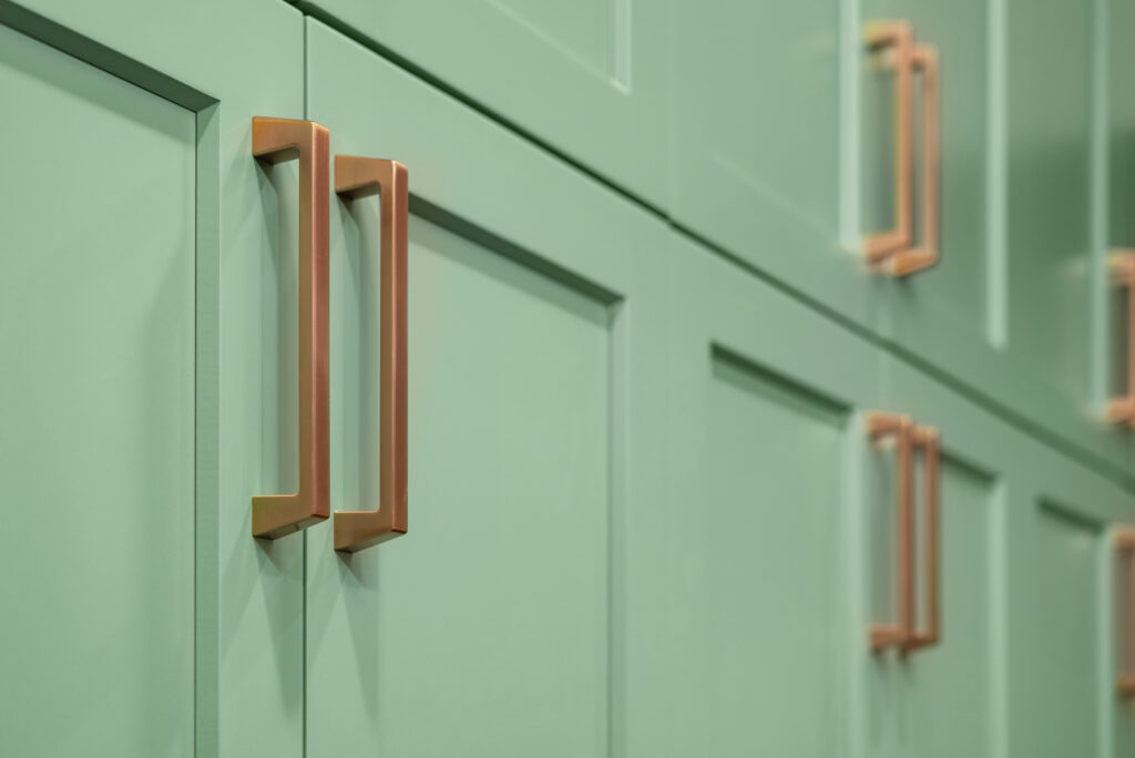 Interior photo of pantry door hardware.