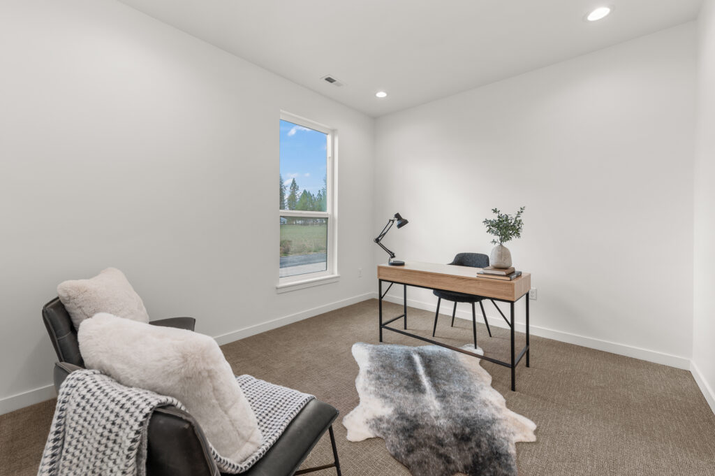 Loon Lake. Interior shot of an office with desk and seating area.