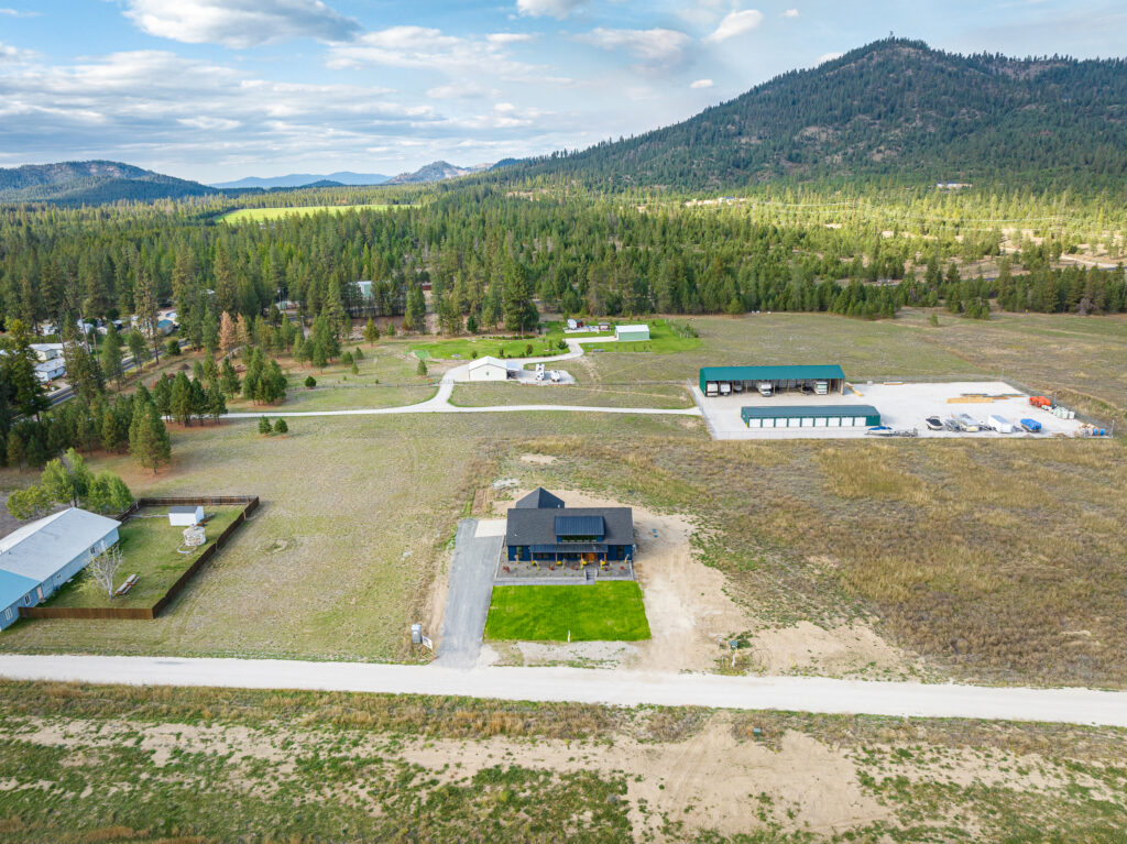 Loon Lake. Exterior shot of the property with custom modern farmhouse.