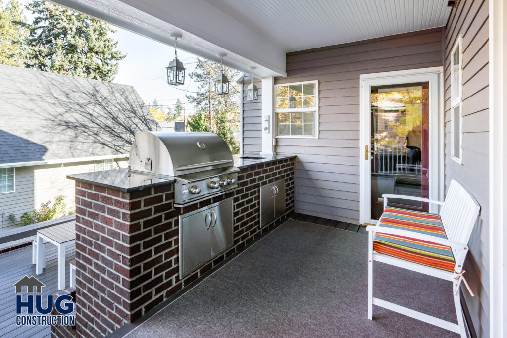 Deck Remodel. Exterior shot of deck and outdoor grill.