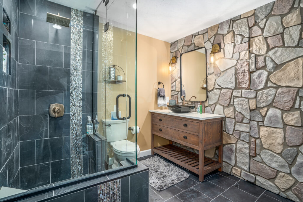 Basement Remodel. Interior photo of bathroom vanity and shower.