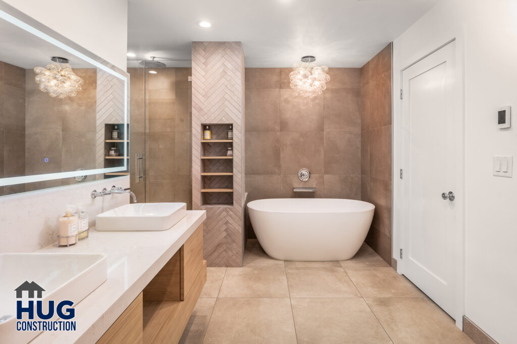 South Walnut Bathroom Remodel. Interior photo of bathroom double vanity and soaking tub.