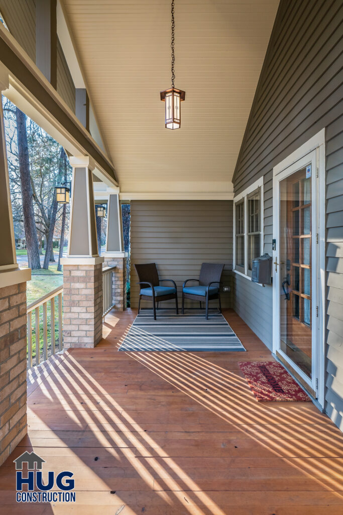 New porch remodel. Exterior photo of new covered porch area.