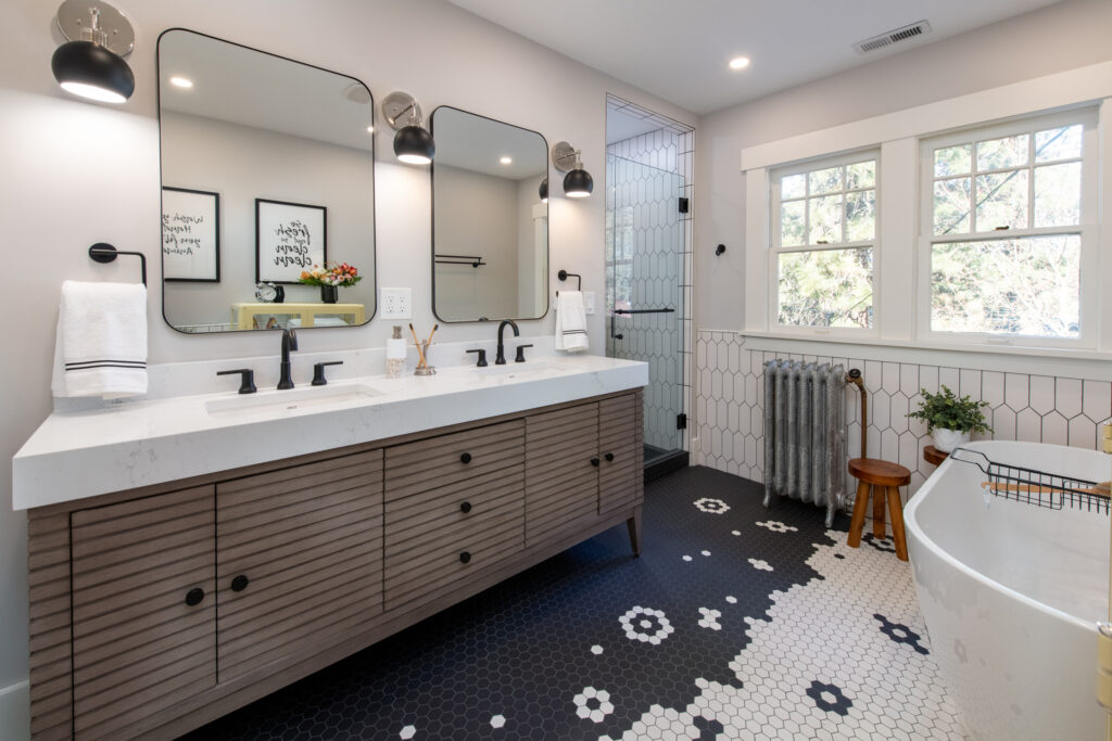 21st Ave Bathroom Remodel. Interior photo of the double vanity and unique floor tile pattern.