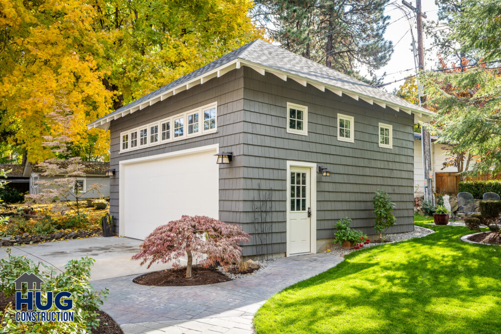 22nd Ave Kitchen and Bathroom Remodel. Exterior photo of garage and man door.