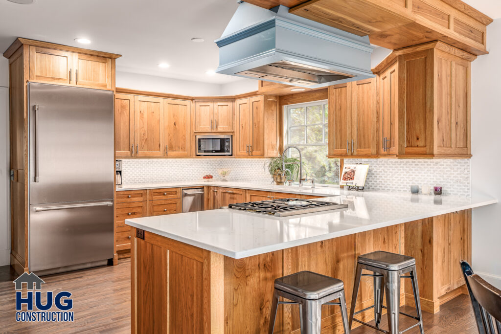 Kitchen and Bathroom Remodel. Interior photo of kitchen with stainless steel oven and range hood.