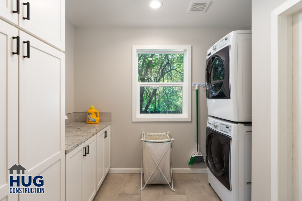 25th Ave Home Remodel. Interior photo of the laundry room with appliances.