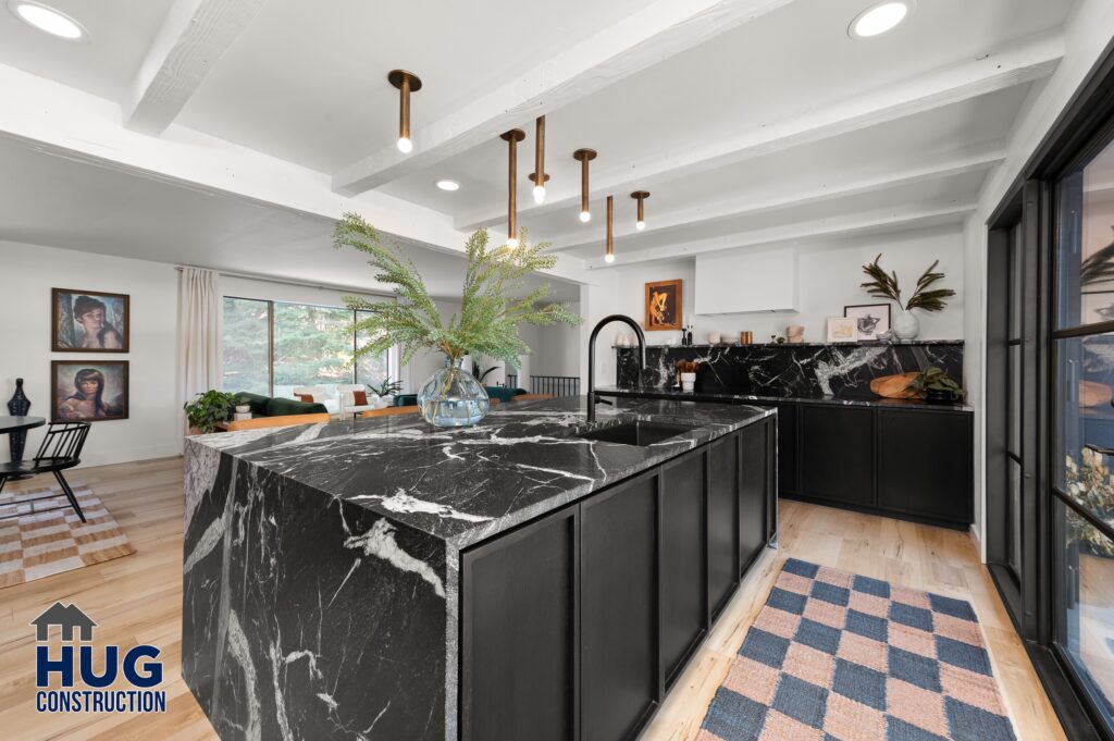 Kitchen Remodel. Black marble Kitchen Island.