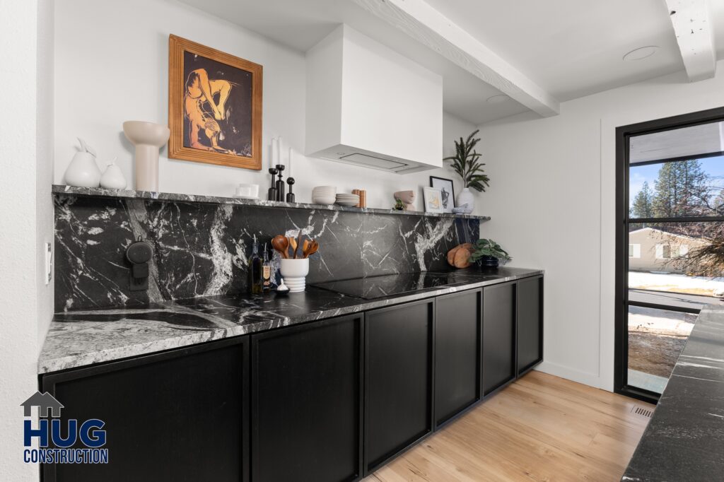 Kitchen Remodel. Black marble Kitchen Island wet bar.