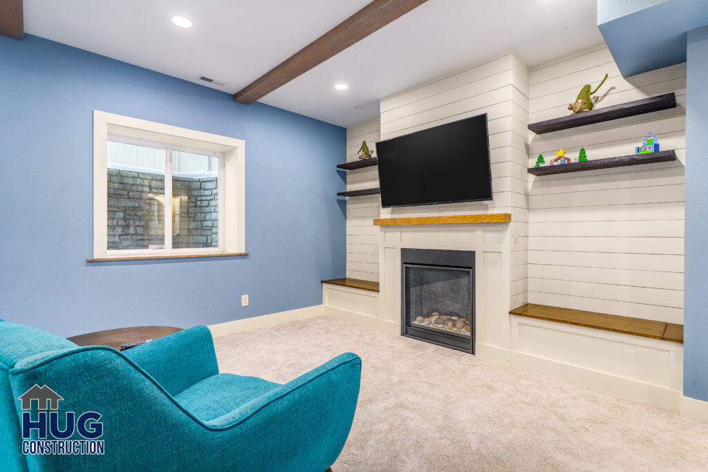 Basement Finish project. Living room and fireplace.