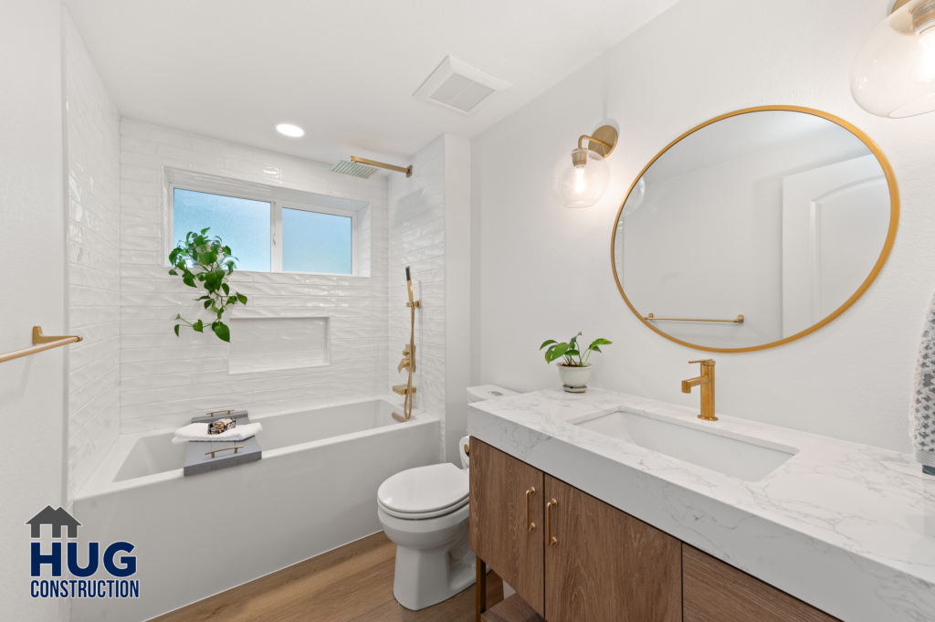 Addition and Kitchen Remodel. Interior photo of bathroom with vanity and tub.