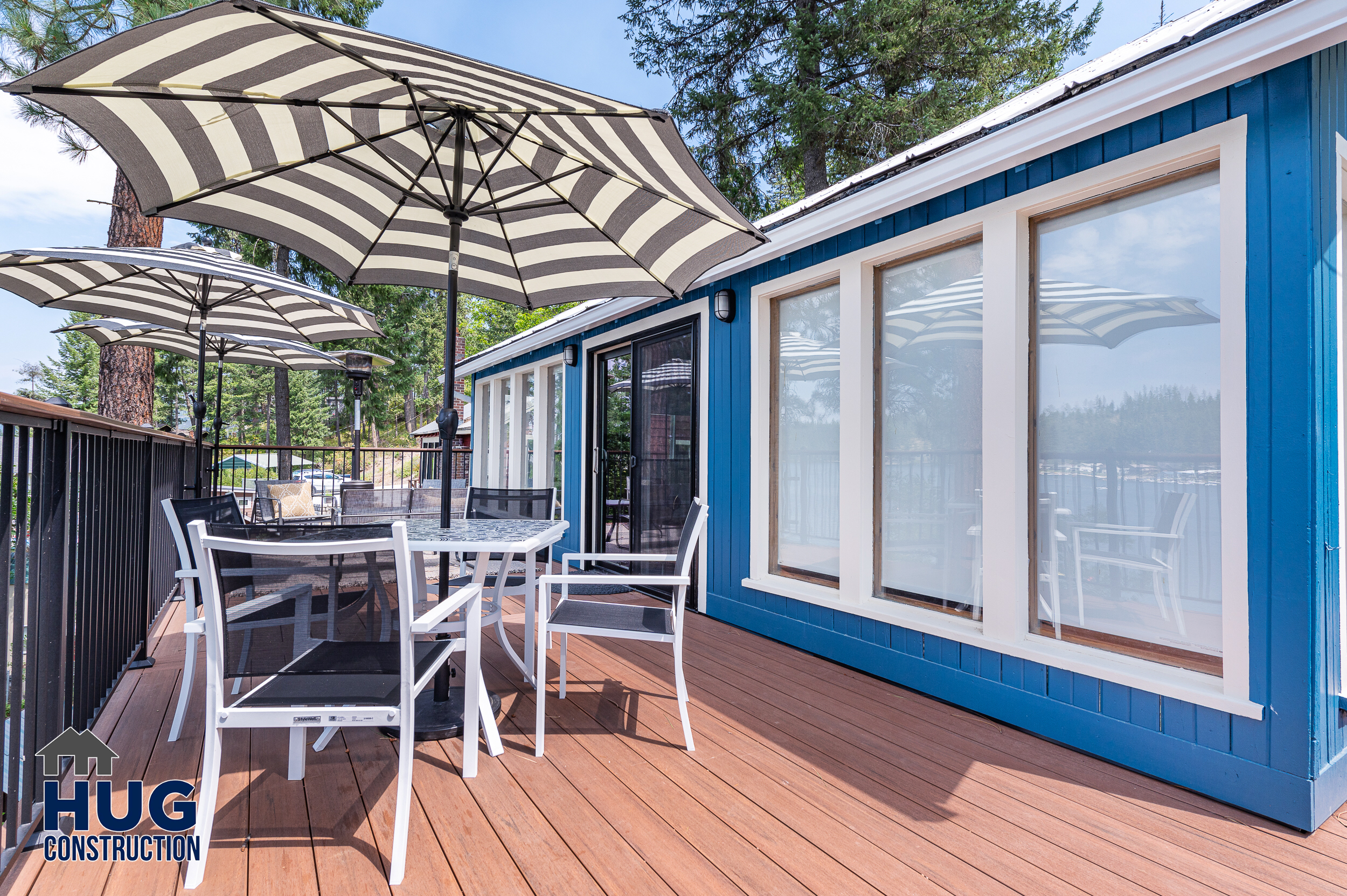 Silver Beach Remodel and New Deck. Photo of deck umbrella and seating area.