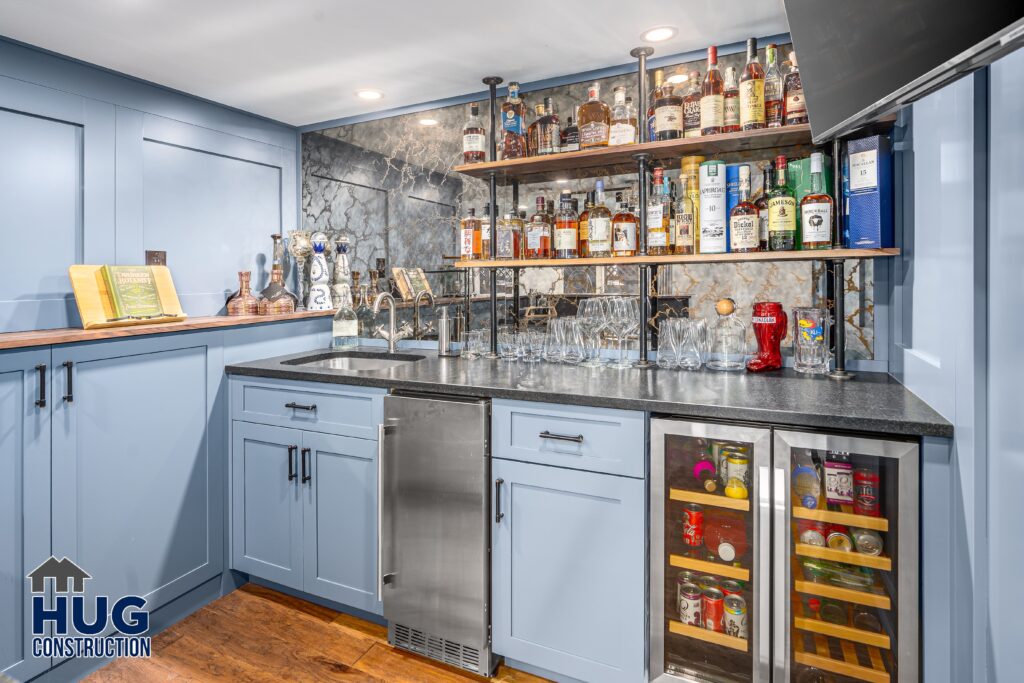 South Ridge Court Basement Bar. Interior photo of the wet bar with appliances and ample shelving.