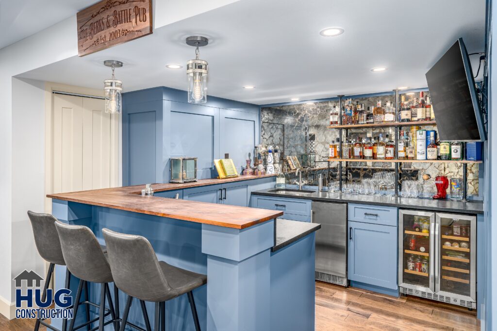 Basement Bar. Interior photo of the wet bar with seating.