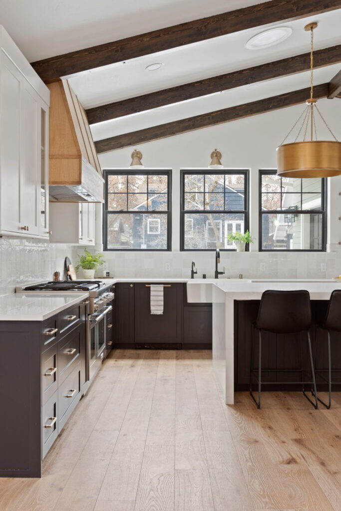 24th Ave Kitchen and Addition Remodel. Interior shot of kitchen with island seating.