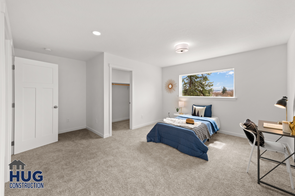 West Cora Avenue Custom Residential Home. Interior photo of a bed in a bedroom.