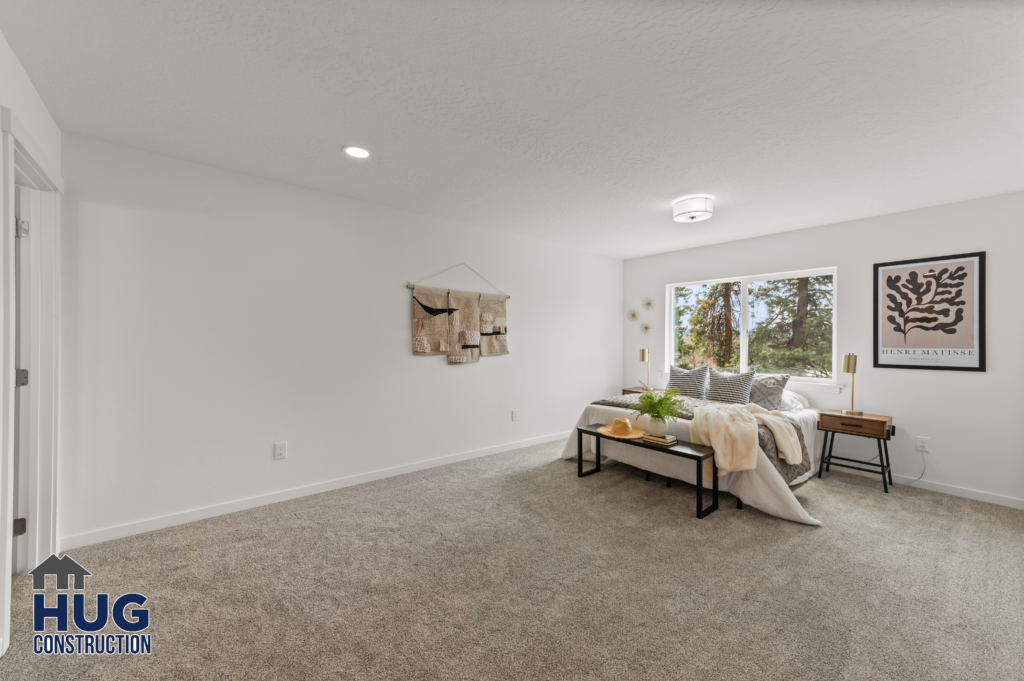 West Cora Avenue Custom Residential Home. Interior photo of a bed in a bedroom.