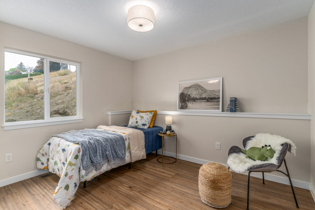 West Cora Avenue Custom Residential Home. Interior photo of a bed in a child's bedroom.