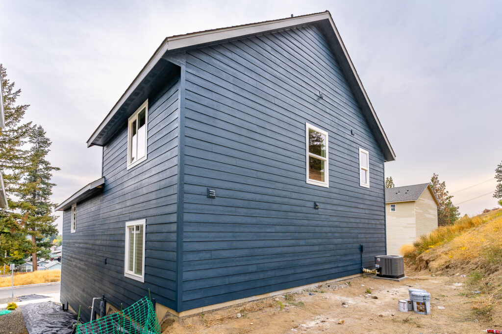 Custom Residential Home. Exterior photo of the rear of the home.